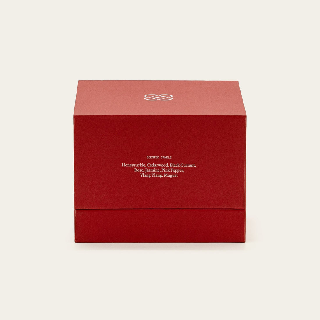 Soy wax ceramic candle by Italic featuring a sleek, minimalist design with a white ceramic holder and a lit wick.