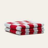 Soft white Pietra Australian Cotton Towels by Italic, featuring thick, plush fabric and subtle woven pattern, displayed hanging.