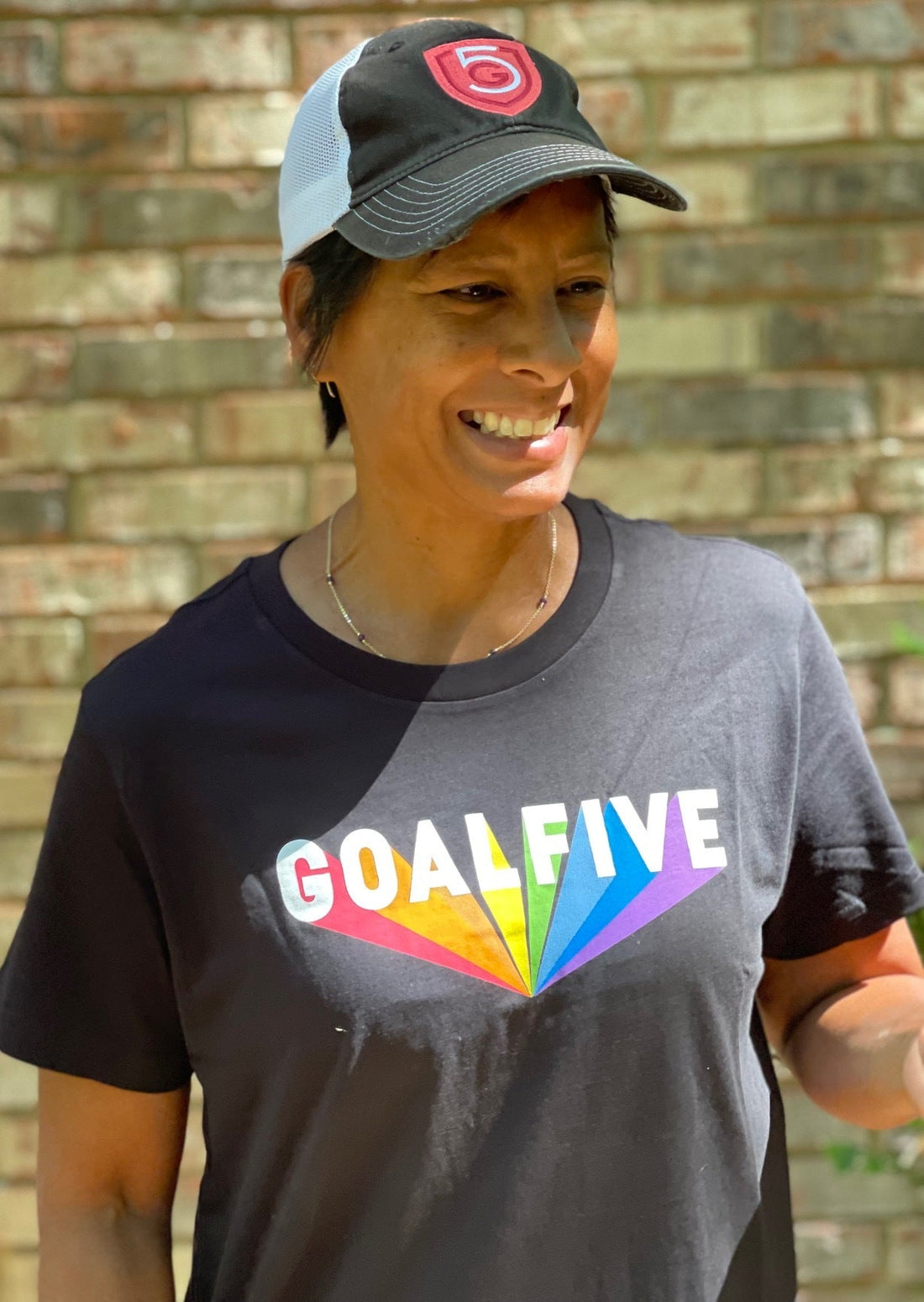 Black cotton Superhuman T-shirt by Goal Five, casual lifestyle shirt with a comfortable fit, shown on a model.
