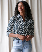 Downeast More Love Top, a stylish women’s sleeveless blouse with a relaxed fit, featuring a soft fabric and vibrant color.