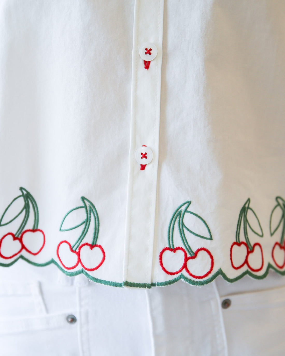 Cherry Cute Button Down top by Downeast, featuring a playful cherry print and classic button-up design.