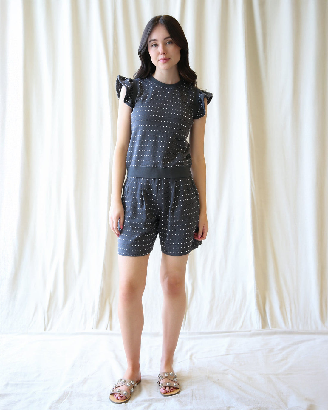 Downeast On Repeat pullover top, soft fabric with long sleeves and a relaxed fit, shown in a casual style.