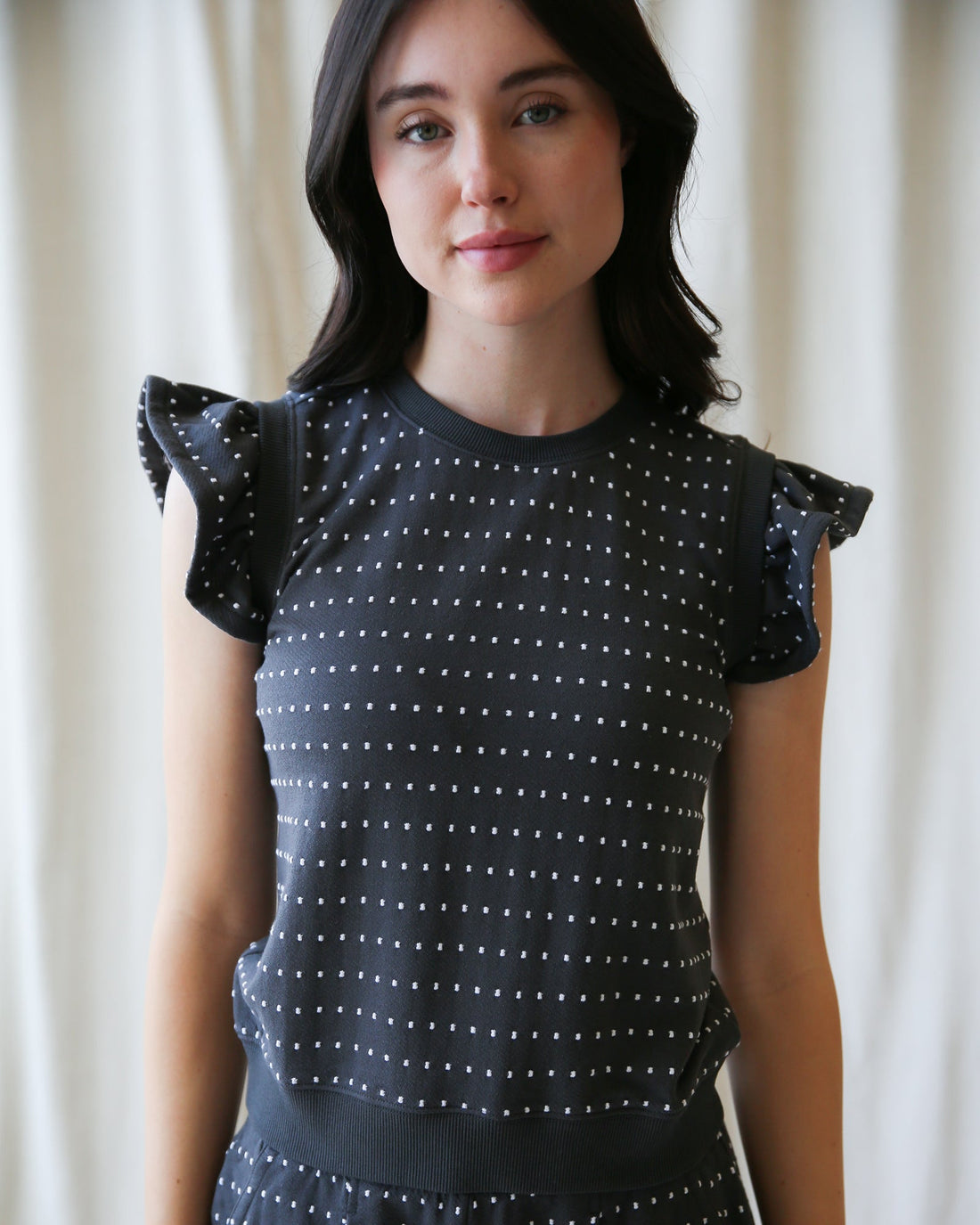 Downeast On Repeat Pullover, cozy long-sleeve tops in soft fabric, shown on a hanger.