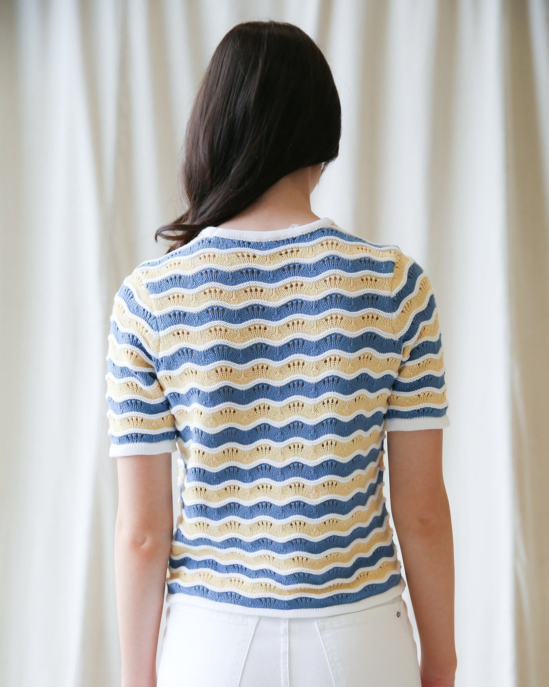 Downeast High Tides sweater featuring a cozy knit design in soft blue and white tones, perfect for casual wear.