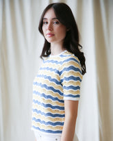 Downeast High Tides sweater showing a cozy knit design in soft blue and white, perfect for casual wear.