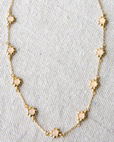 Downeast mini flower necklace with delicate floral pendant on a chain, perfect for layered or everyday wear