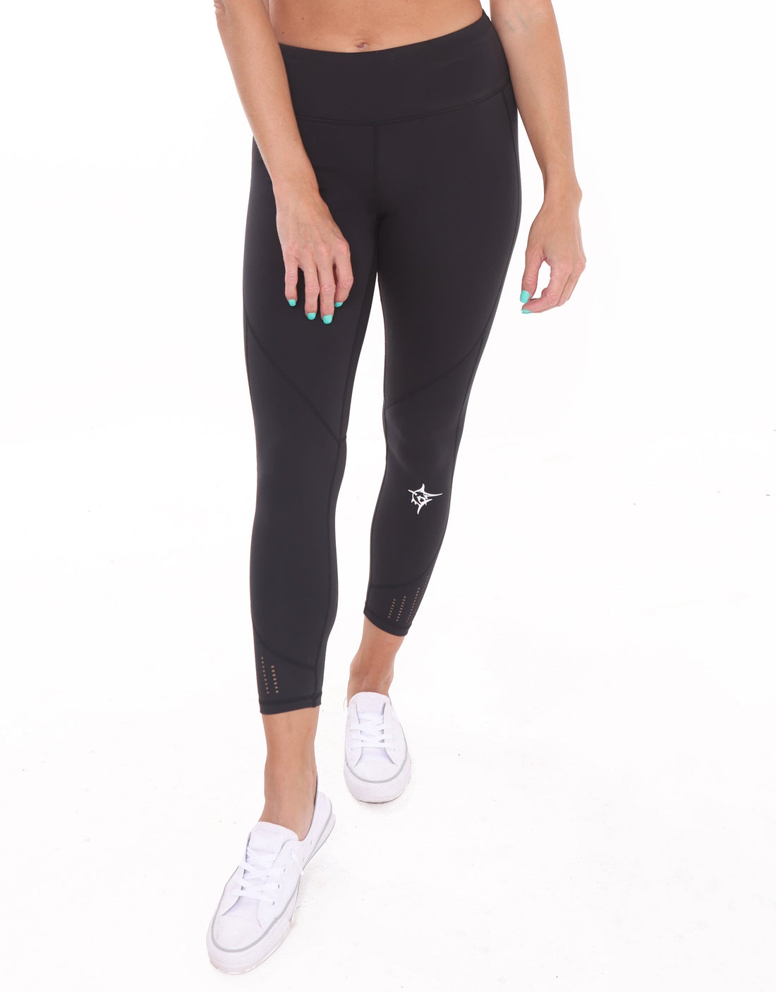 Black HydroFlex Cut Out Leggings by White Water Life, featuring stylish cutouts and a sleek, stretchy fit for active wear.