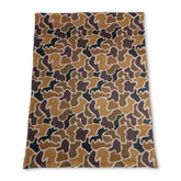 Brown polka dots camo baby boy hunting blanket by Mini Rodeo, soft fabric with a camouflage and polka dot pattern for infants.