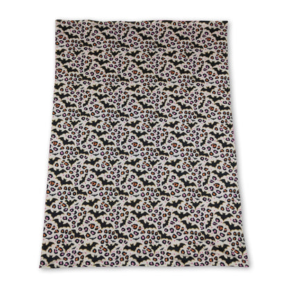 Pink leopard print Halloween blanket for baby girls by Mini Rodeo, soft and cozy with playful animal design.