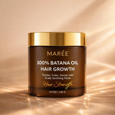 Pure Batana Hair Growth Paste by Maree, showing the natural green paste in a clear container with a textured surface.