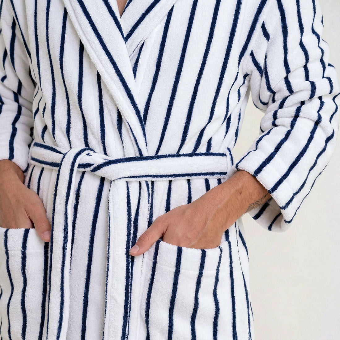 Navy striped Italic Ultraplush Australian cotton unisex bathrobe displayed on a hanger, showing soft fabric and comfortable fit.