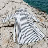 Navy striped Ultraplush Australian cotton unisex bathrobe by Italic, shown on a model with a cozy, relaxed fit.