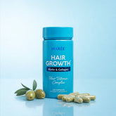 Bottle of Maree Biotin & Collagen Hair Growth Complex supplement with label showing ingredients and branding.