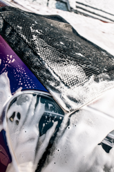 Close-up of Blackline® Synthetic Clay Towel for car detailing, showing its textured surface for effective paint contamination removal.