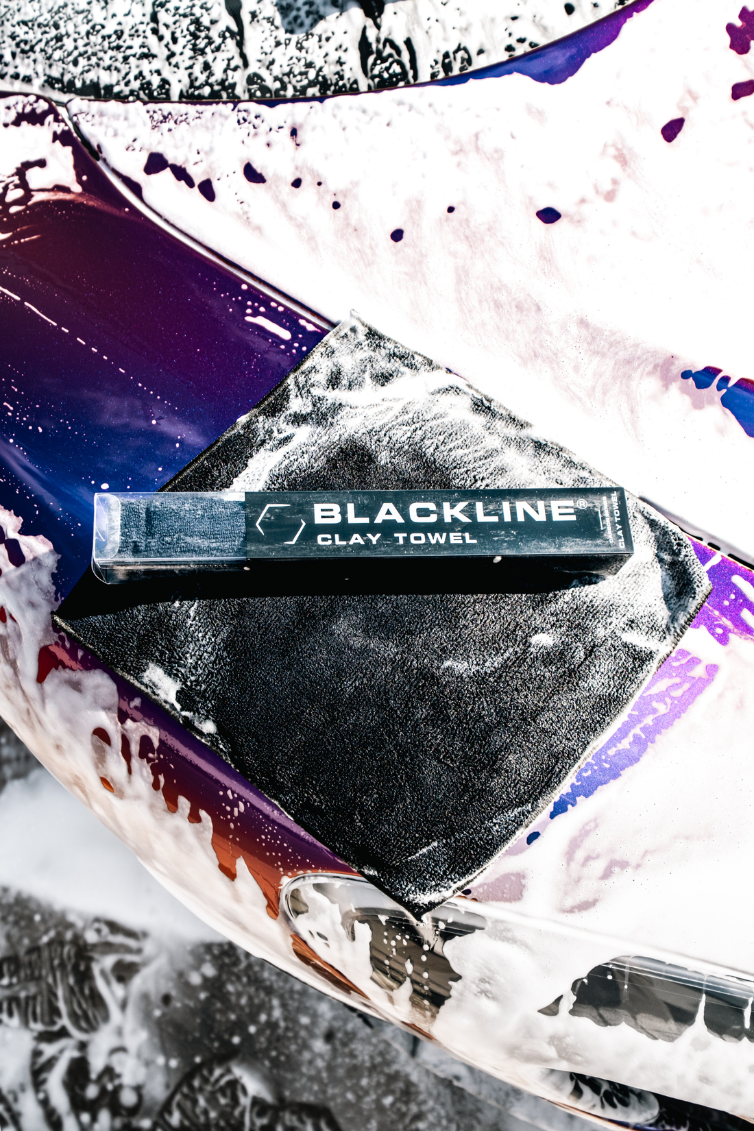 Blackline Synthetic Clay Towel for car detailing, soft and durable cleaning cloth for removing contaminants from vehicle surfaces.