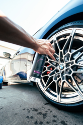 Blackline Car Care Blackline Iron Remover bottle with spray nozzle, designed for removing iron contaminants from vehicle surfaces.