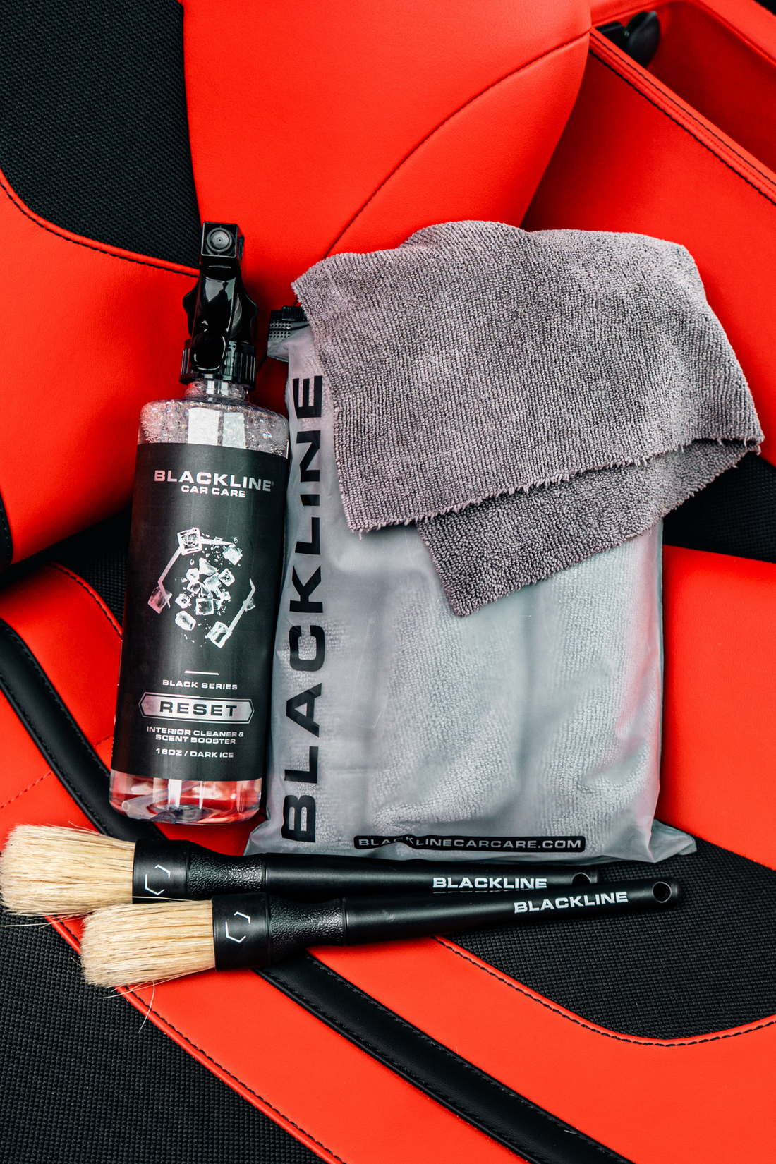 Blackline Car Care BLACKLINE® RESET Interior Cleaner and Scent Booster in dark ice finish on Ferrari F12 seat.