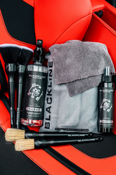 Blackline Car Care BLACKLINE® RESET interior cleaner and scent booster in a Ferrari F12 seat, showcasing a dark ice scent experience.