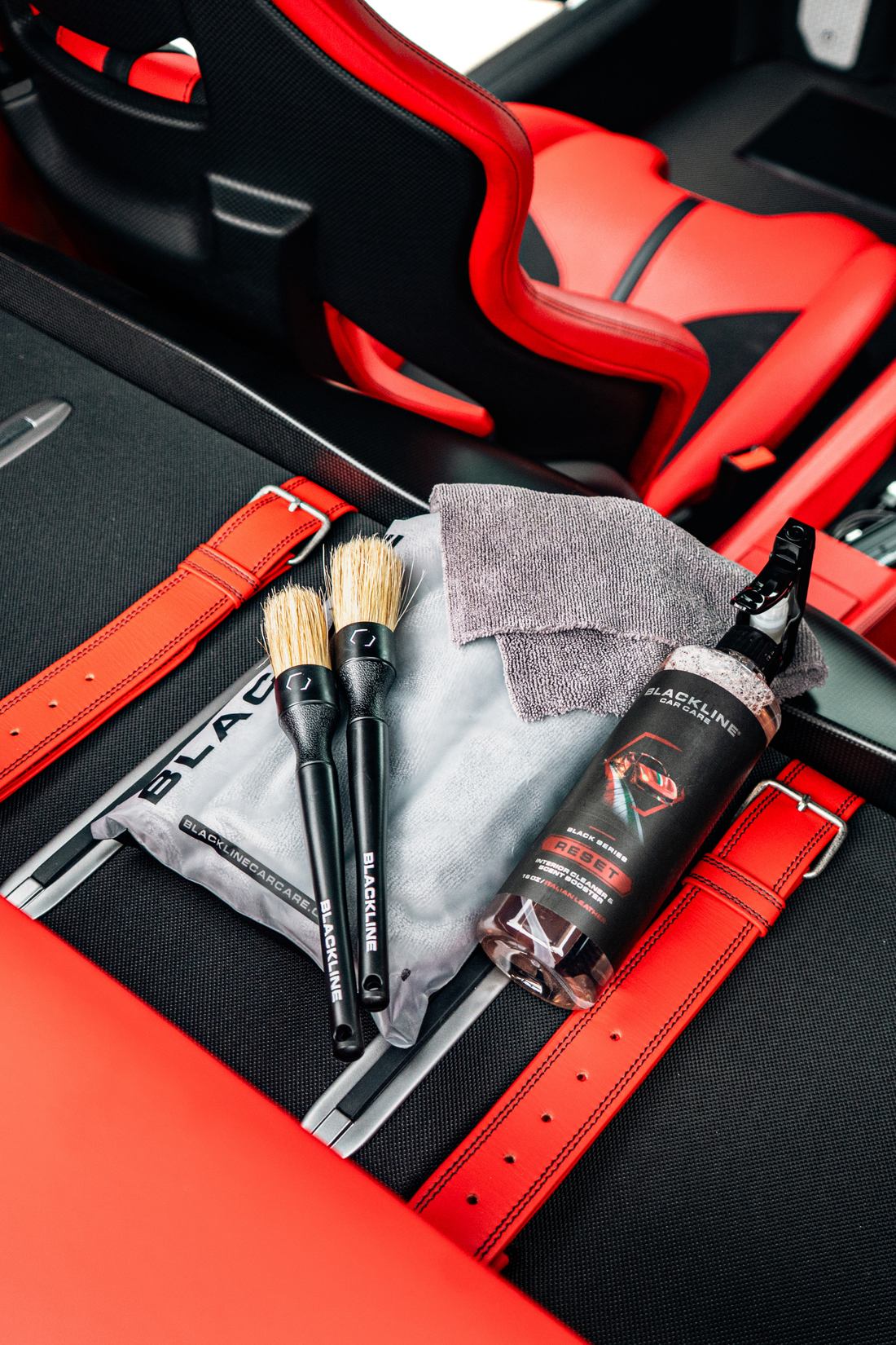Blackline Car Care RESET interior cleaner and scent booster in Ferrari F12 trunk with Italian leather interior and complete cleaning system