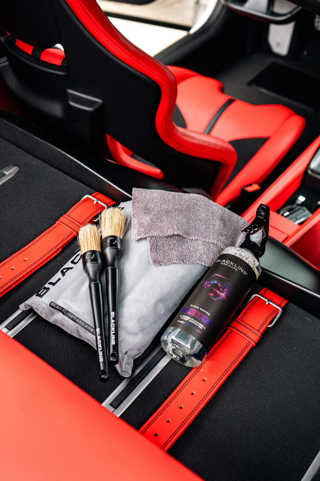 Blackline Car Care BLACKLINE® RESET interior cleaner and scent booster in Ferrari F12 trunk, showing the complete system setup.