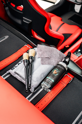 Blackline Car Care BLACKLINE® RESET Interior Cleaner and Scent Booster in Ferrari F12 trunk, showing the complete system setup