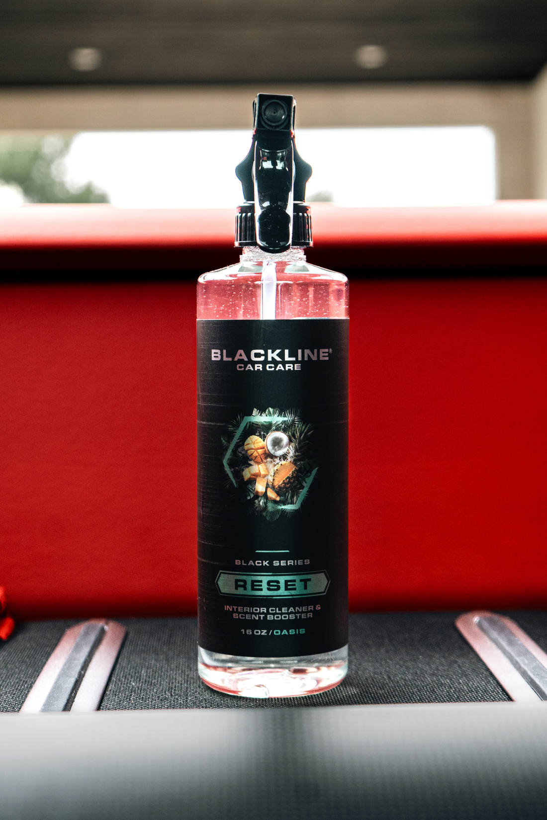 Blackline Car Care RESET Interior Cleaner and Scent Booster bottle, with label details visible.
