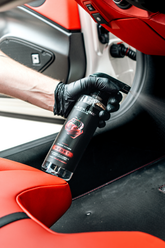 Blackline Car Care BLACKLINE® RESET interior cleaner and scent booster spray with wild cherry scent, showing the spray bottle and label.