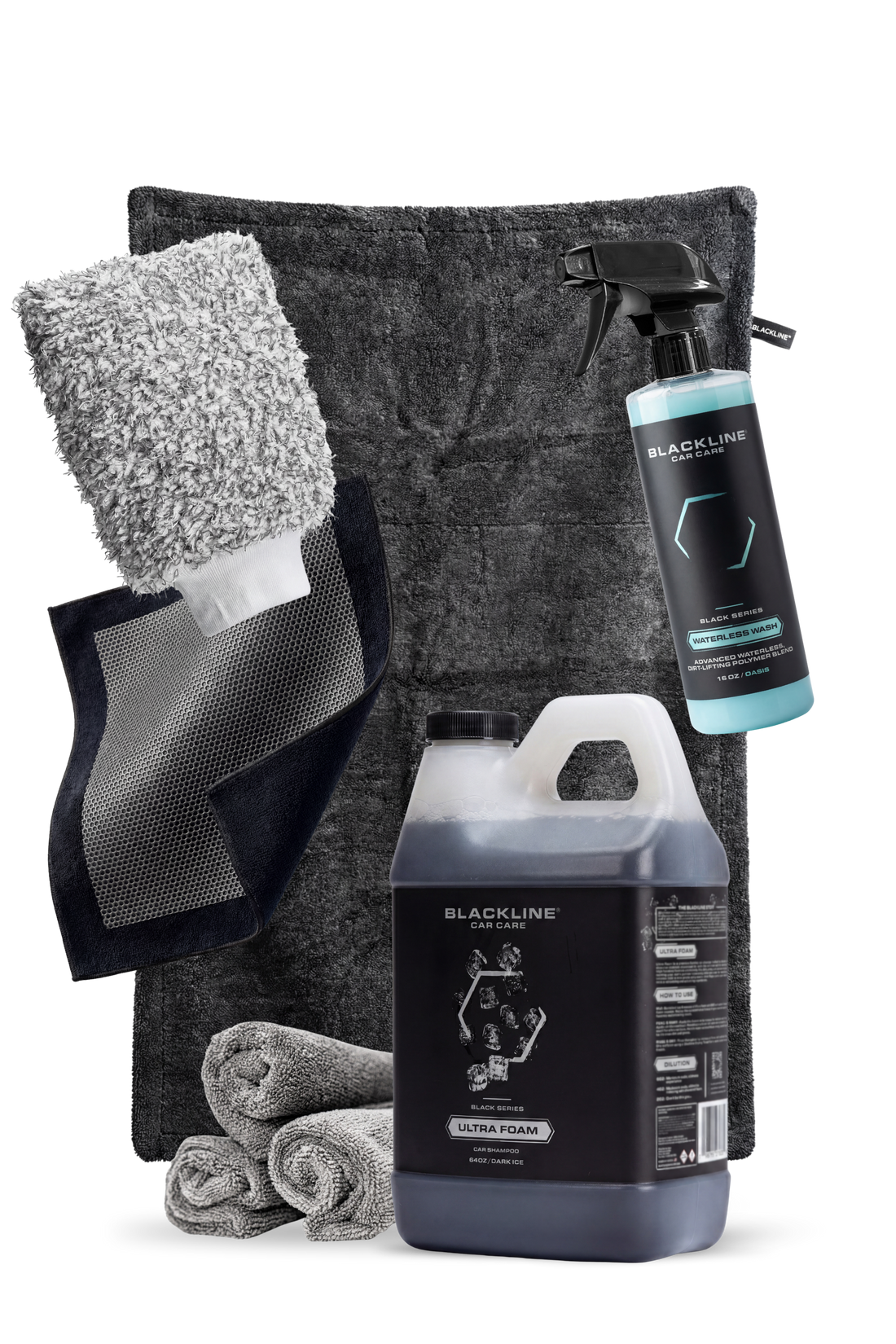 Blackline Car Care BLACKLINE® Ultra Foam car shampoo in a 64oz bottle with dark ice label, showcasing thick foam for vehicle cleaning.