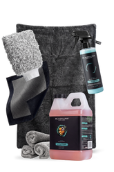 Blackline Car Care BLACKLINE® Ultra Foam car shampoo in a 64oz bottle, showing rich foam for vehicle cleaning.