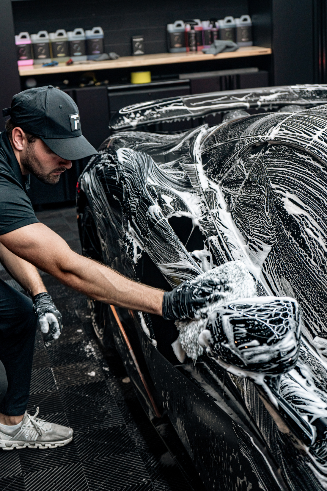 Blackline Car Care BLACKLINE® microfiber wash mitt in use, showing soft, plush material designed for gentle vehicle cleaning.
