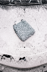 Blackline Car Care BLACKLINE® microfiber wash mitt in use, designed for gentle, effective vehicle cleaning with soft microfiber material.