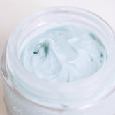 Blue Beauty Cream soothing tallow face cream by Pretty Farm Girl, shown in a jar with a smooth, creamy blue texture.