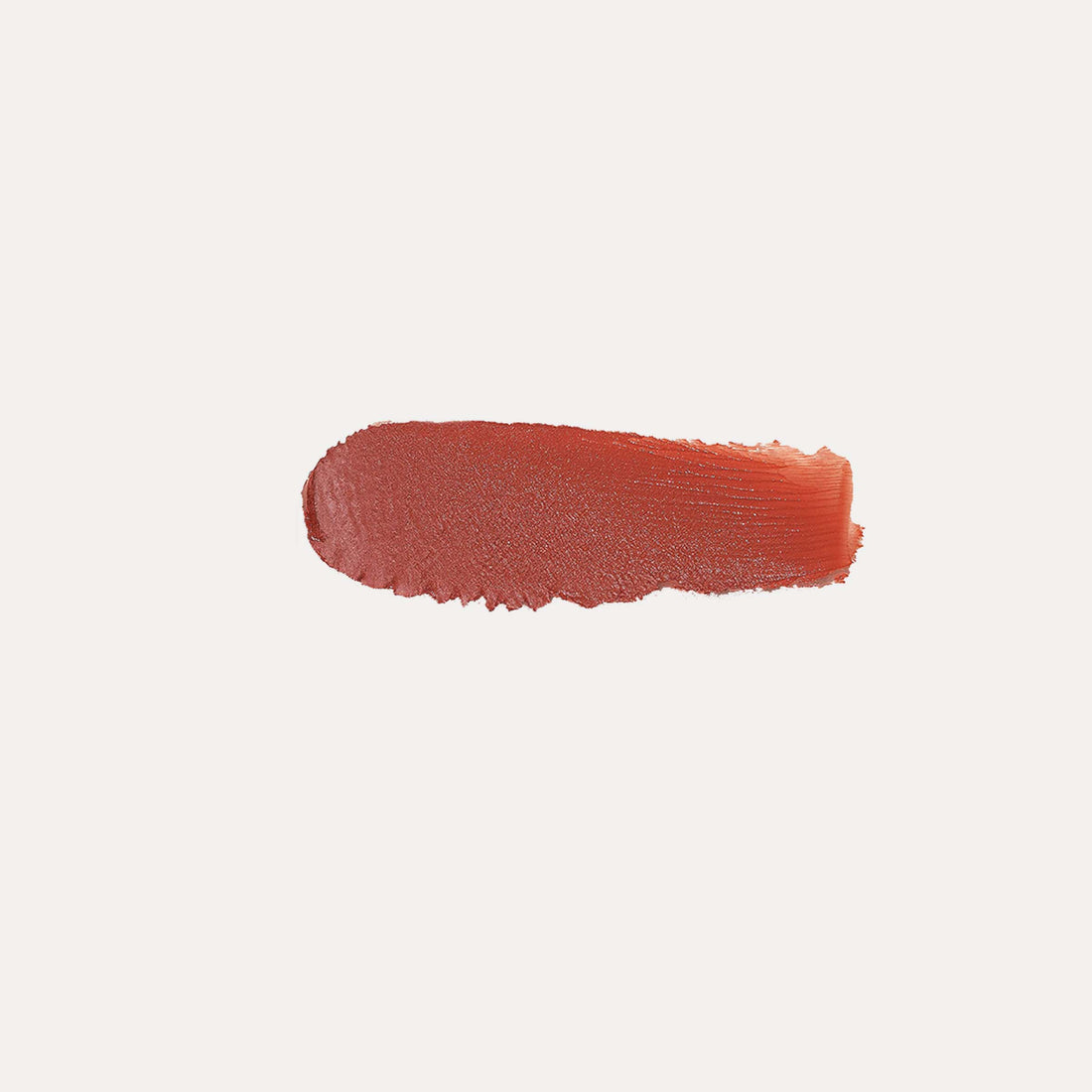 YENSA Super Serum Silk Buildable Cream Blush in Ginger Blaze shade, showing a warm, vibrant orange-toned blush on skin.