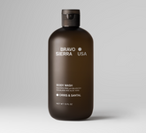 Bravo Sierra body wash with Oris and Santal scent, featuring a sleek bottle and creamy lather for refreshing cleansing.