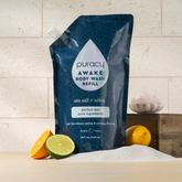 Puracy acidified, pH-balanced body wash in refill bottle, gentle cleanser for healthy skin, with natural ingredients.