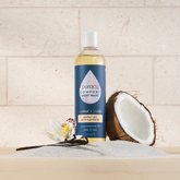 Puracy acidified, pH balanced body wash in a 12oz bottle showing the clear gel and label with brand name and product details.