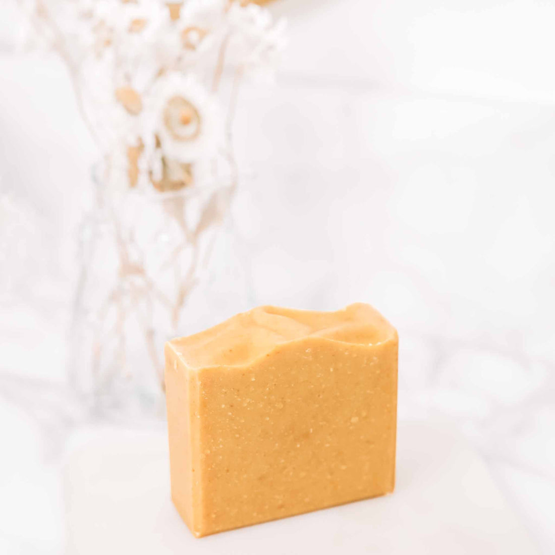 Brightening Vitamin C and Bakuchiol soap bar by Pretty Farm Girl, showing a natural skincare bar with citrus and herbal ingredients.