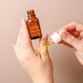 Pretty Farm Girl Brightening Vitamin C Face Serum bottle with dropper, showcasing the product&