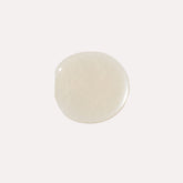 YENSA Luxe Lip Nourishing Oil with hyaluronic acid and vitamin E, clear lip oil in a sleek transparent bottle.
