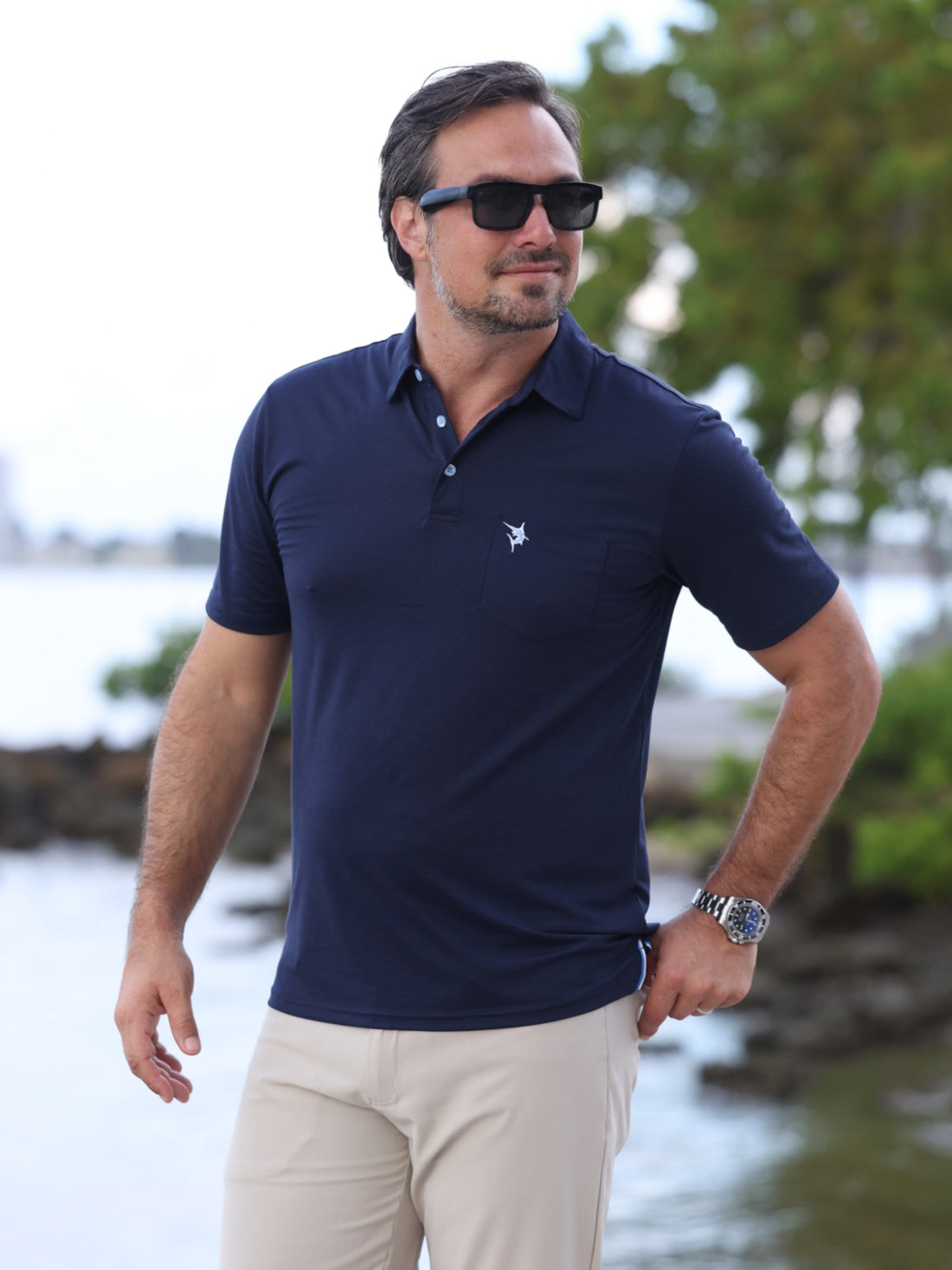 White Water Life Charleston Polo in various colors, close-up of fabric and collar details.