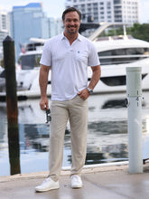 White Water Life Charleston Polo in various colors, featuring a classic fit and soft fabric, displayed on a mannequin.