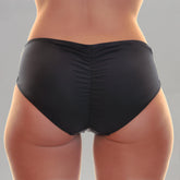 Forever Young Swimwear Capri Side Loop Double Rise Bikini Bottom shown with side loop detail and high-rise fit in vibrant swim fabric.