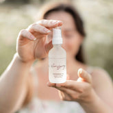 Pretty Farm Girl clarifying cleansing oil for acne-prone skin, showing a bottle of face cleanser with natural ingredients.