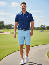 White Water Life Coastline navy polo shirt with collar and short sleeves, displaying a classic fit and subtle branding.