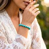 Blue Amazonite bracelet featuring polished stones, crafted by Conscious Items, styled for elegant wear.