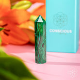 Malachite Phoenix sculpture by Conscious Items, a striking home decoration with vibrant green and gold details.