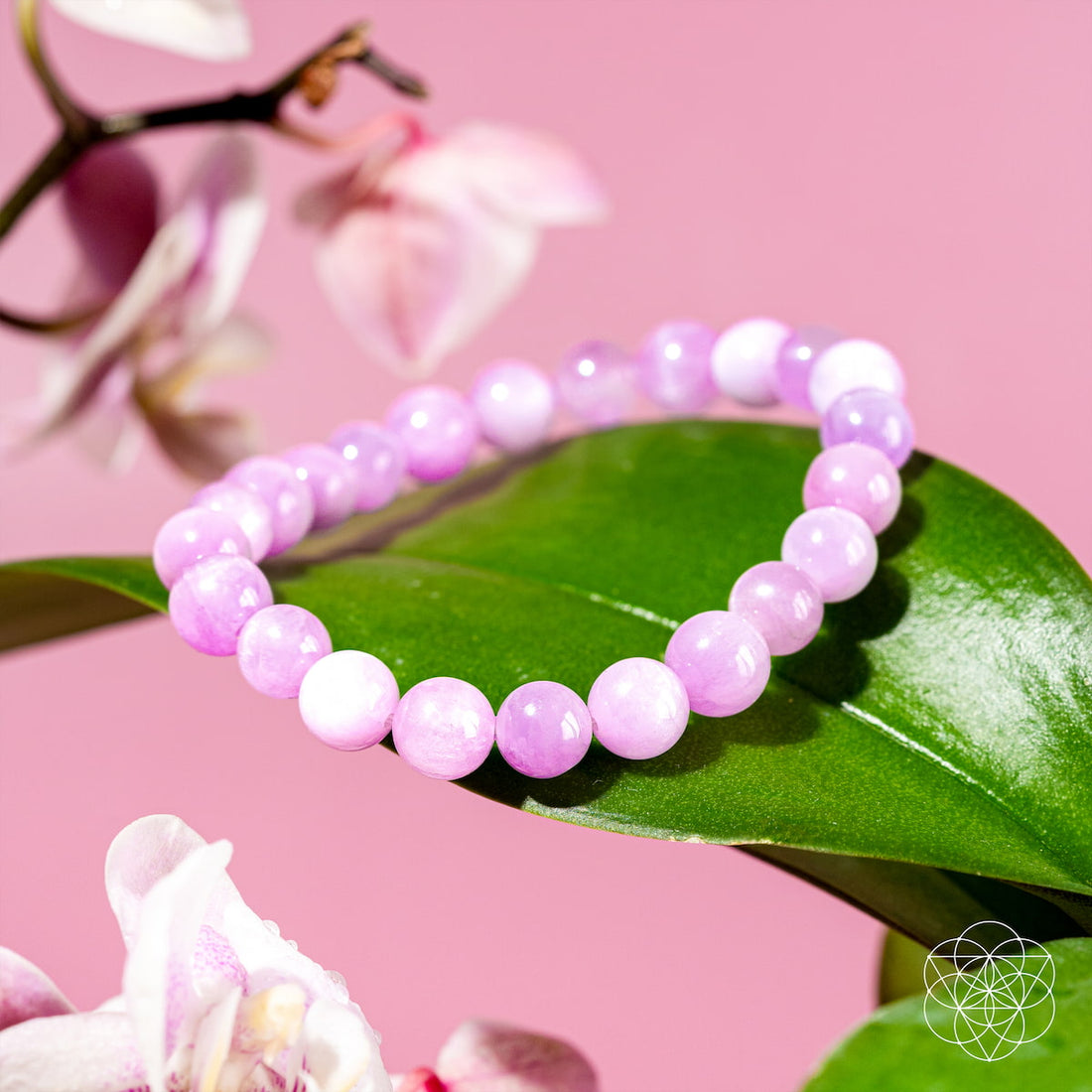 Pink Kunzite bracelet from Conscious Items featuring a delicate, polished stone design with a silver clasp.