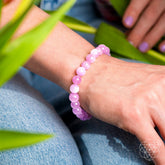 Pink Kunzite bracelet from Conscious Items featuring a delicate, heart-shaped design and vibrant pink gemstones.