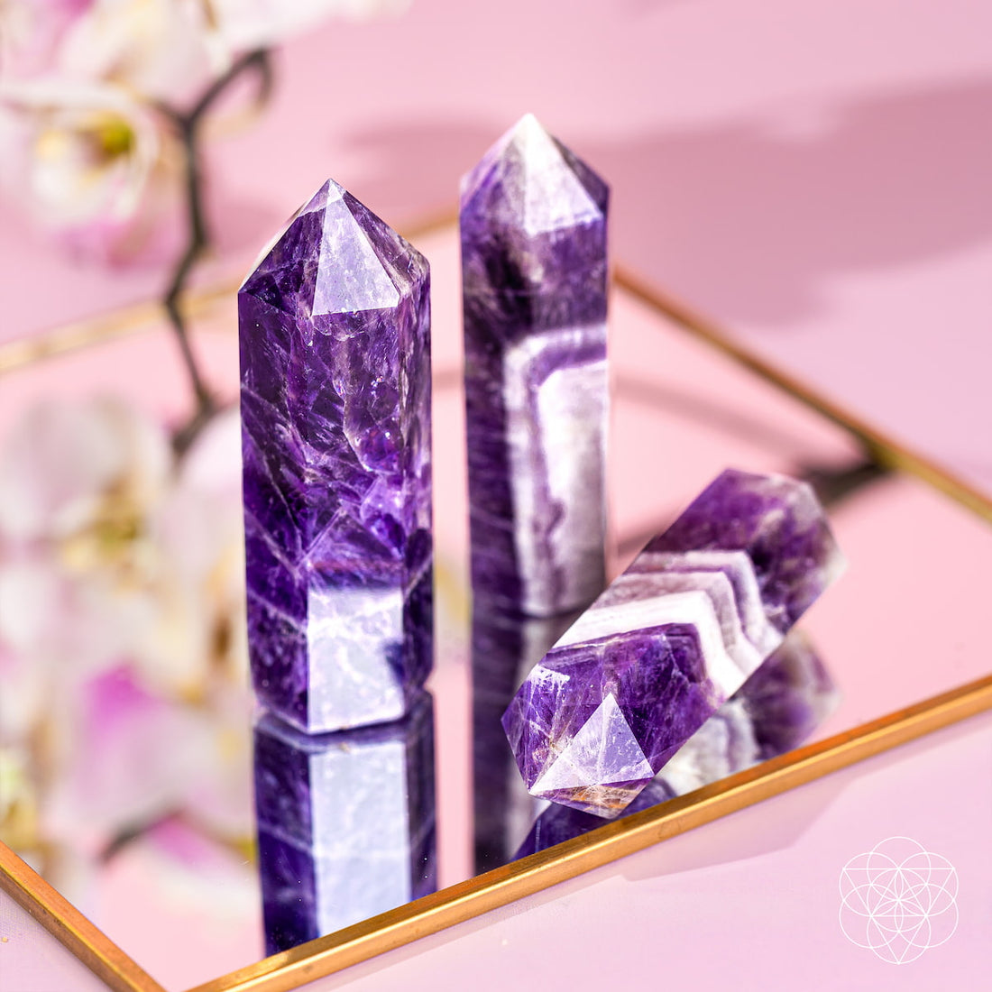 Chevron Amethyst Point of Transformation home decor piece by Conscious Items, showcasing a polished purple and white quartz crystal.