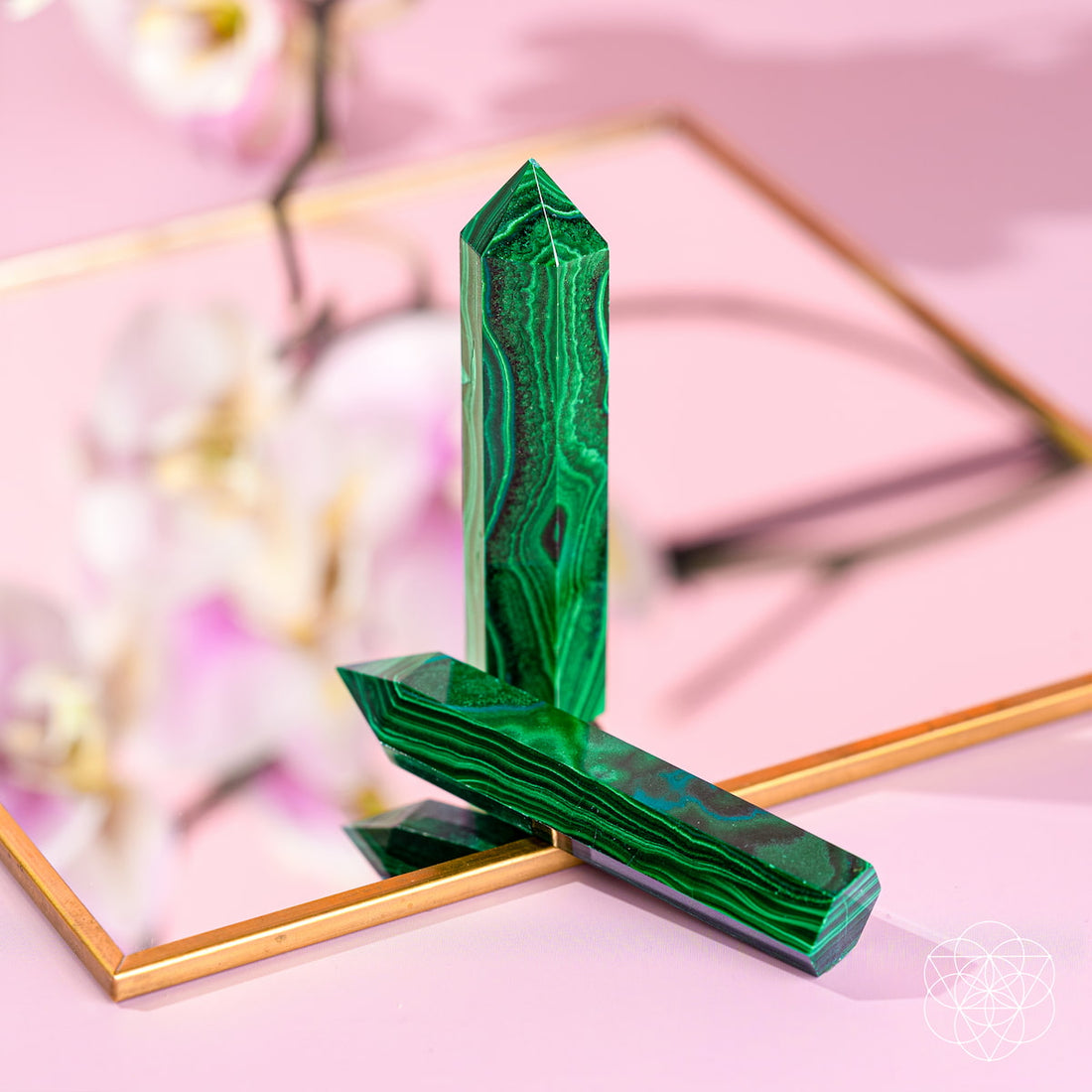 Malachite phoenix sculpture from Conscious Items, a striking home decoration piece with vibrant green and intricate details.